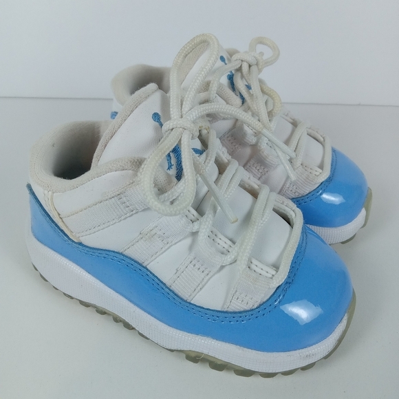 Nike Air Jordan 11 Retro Low Toddler Baby 5C White UNC Carolina Blue 505836-106 - Picture 1 of 8